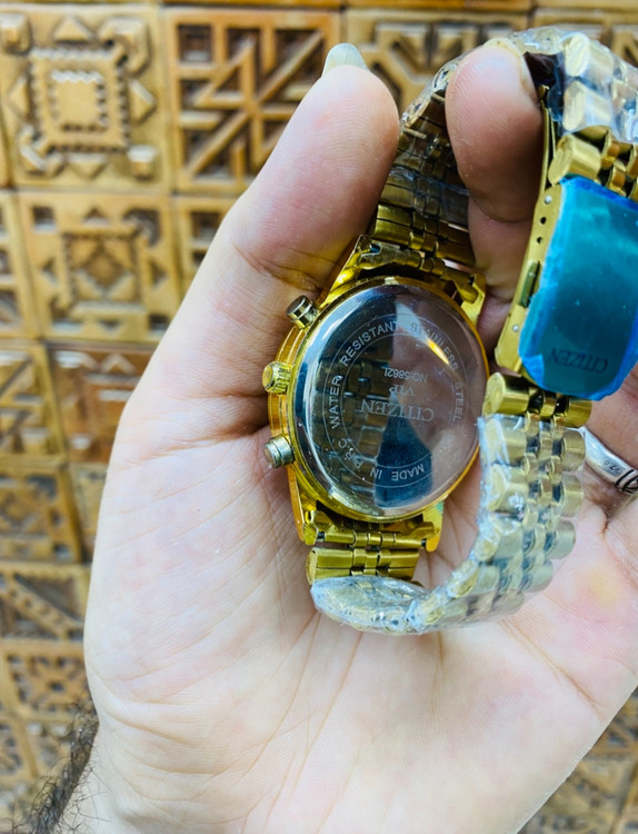 عکس از بند استیل طلایی ساعت ست